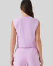 Back view of cropped active tank in pink purple