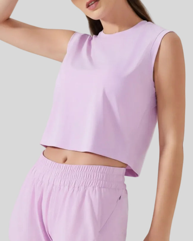 Cropped active tank in pink purple shown from front left angle
