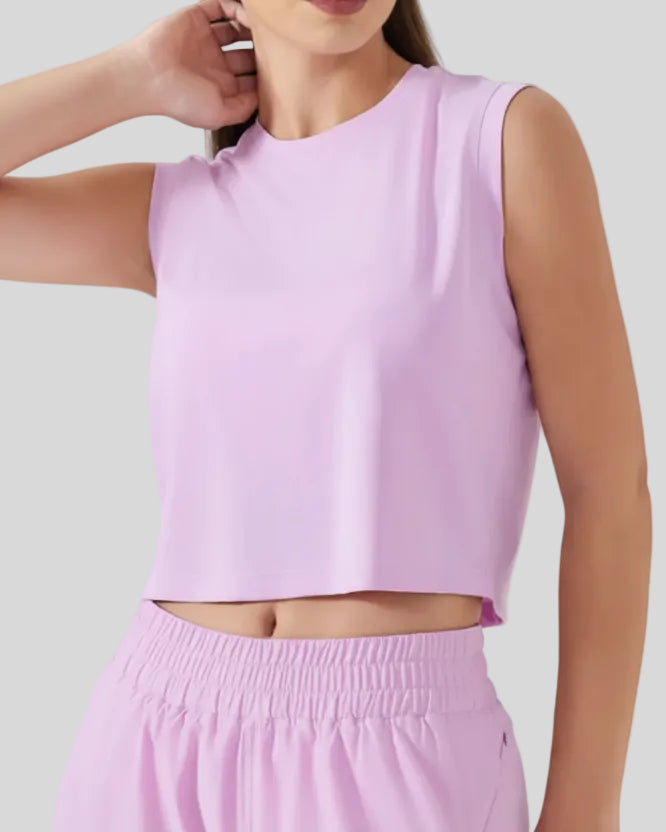 Side angle view of pink purple cropped active tank