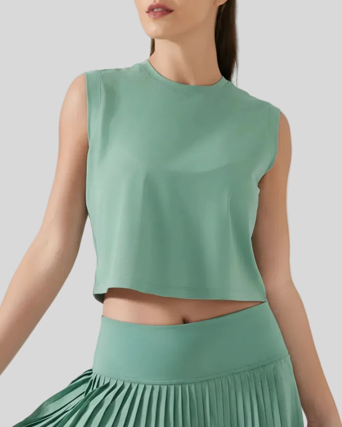 Front angle view of teal cropped active tank