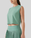 Cropped active tank in teal shown from front left angle