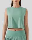 Cropped active tank in teal with round neckline, front view