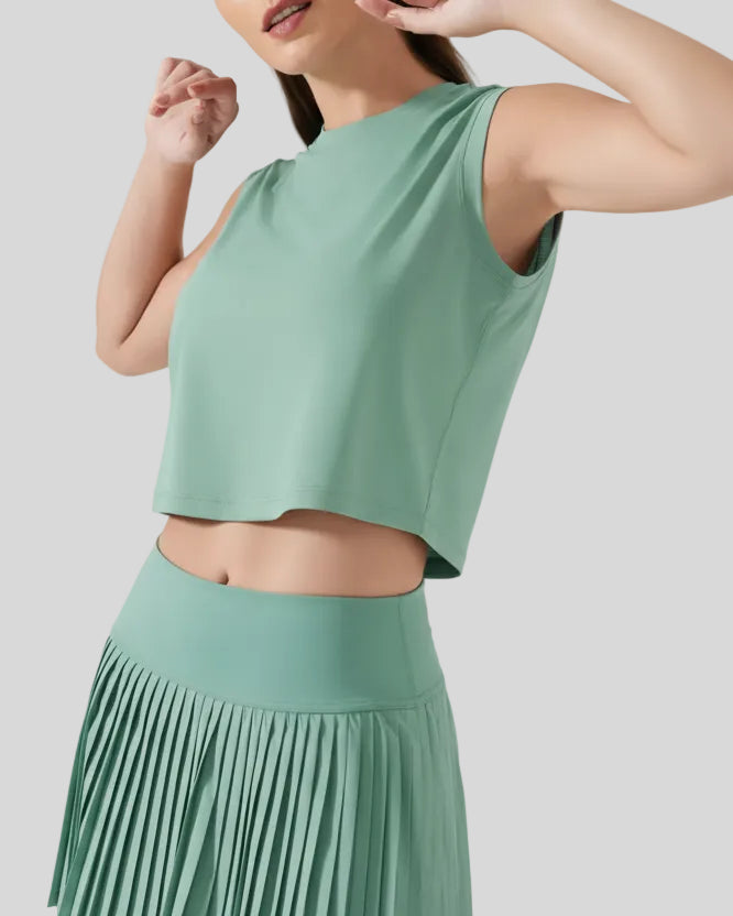 Side view of teal cropped active tank
