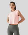 Cropped active tank in watermelon pink shown from front left angle