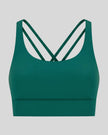 3D product view of the AlignCross Studio Bra in dark green, highlighting the scoop neckline and crisscross back straps.