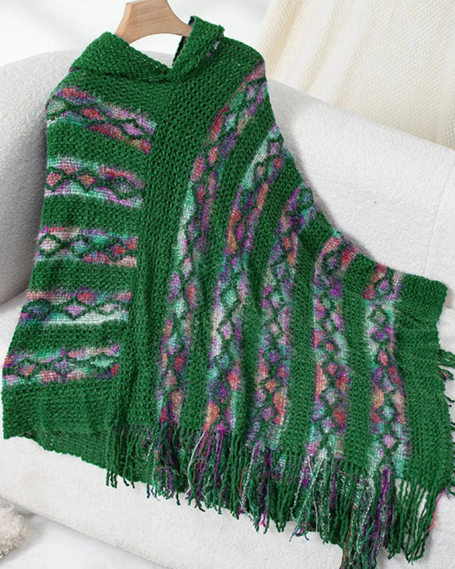 Flat lay front view of AccentFlow Fringe Hooded Poncho in dark green