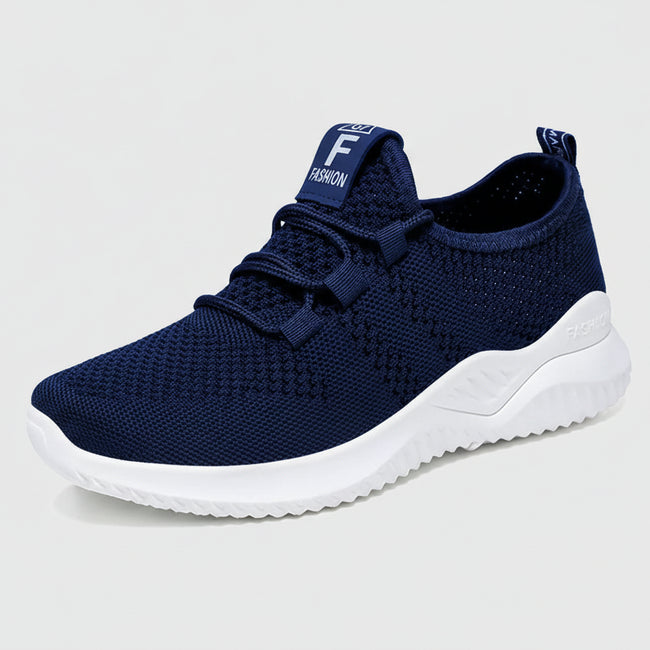Navy mesh sneaker side view with breathable mesh upper and flexible sole