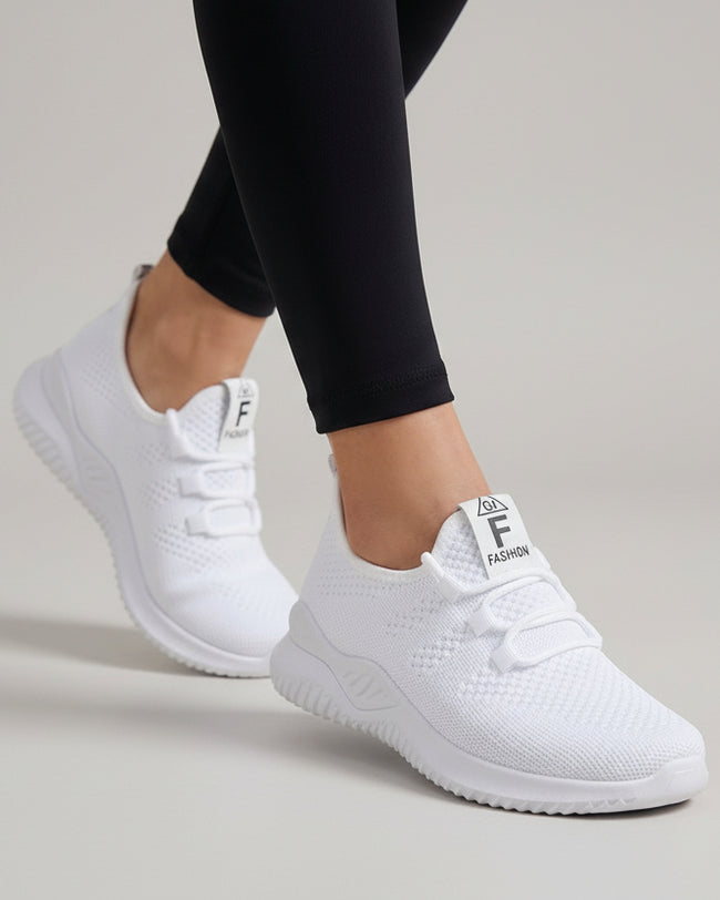 Close-up of mesh sneakers highlighting breathable mesh texture and flexible sole