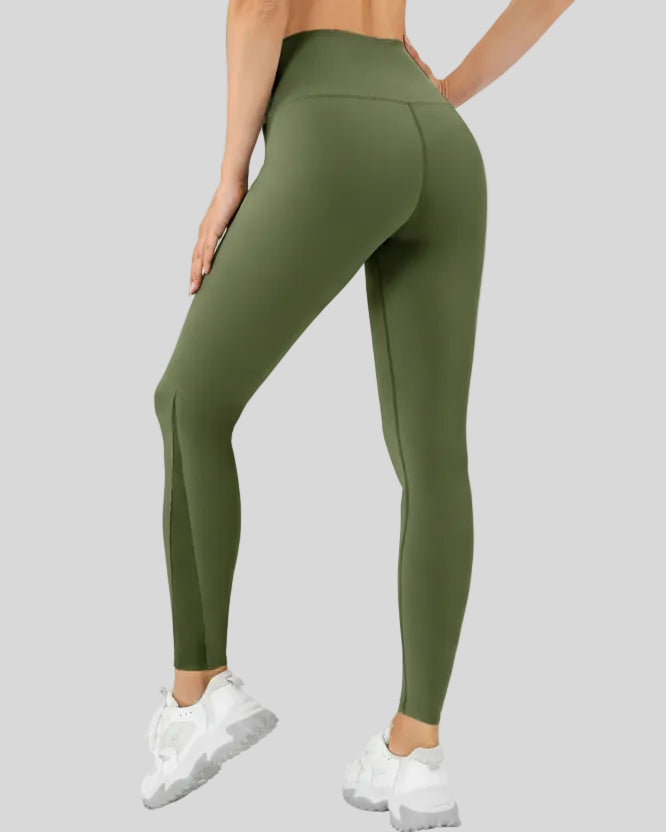 Back angle view of AeroFlow mesh legging in matcha green with smooth sculpted fit