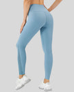Back angle view of AeroFlow mesh legging in sky blue with smooth sculpted fit