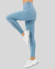 Left side view of sky blue AeroFlow mesh legging featuring lightweight mesh detailing