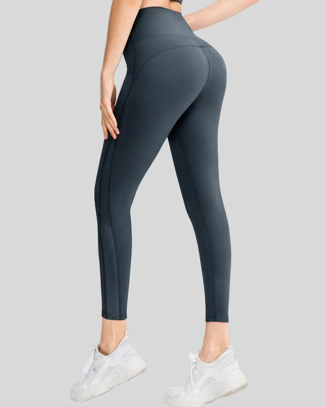 Back angle view of AeroFlow mesh legging in dark gray highlighting airflow mesh details