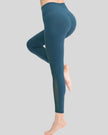 Back angle view of AeroFlow mesh legging in deep teal highlighting airflow mesh details