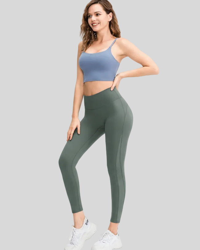 Full body front angle view of AeroFlow mesh legging in matcha green with breathable side panels