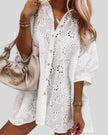 Aira Eyelet Shirt in white angled view showing relaxed silhouette and button-down design