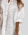 Close-up of Aira Eyelet Shirt highlighting eyelet embroidery and lightweight fabric texture