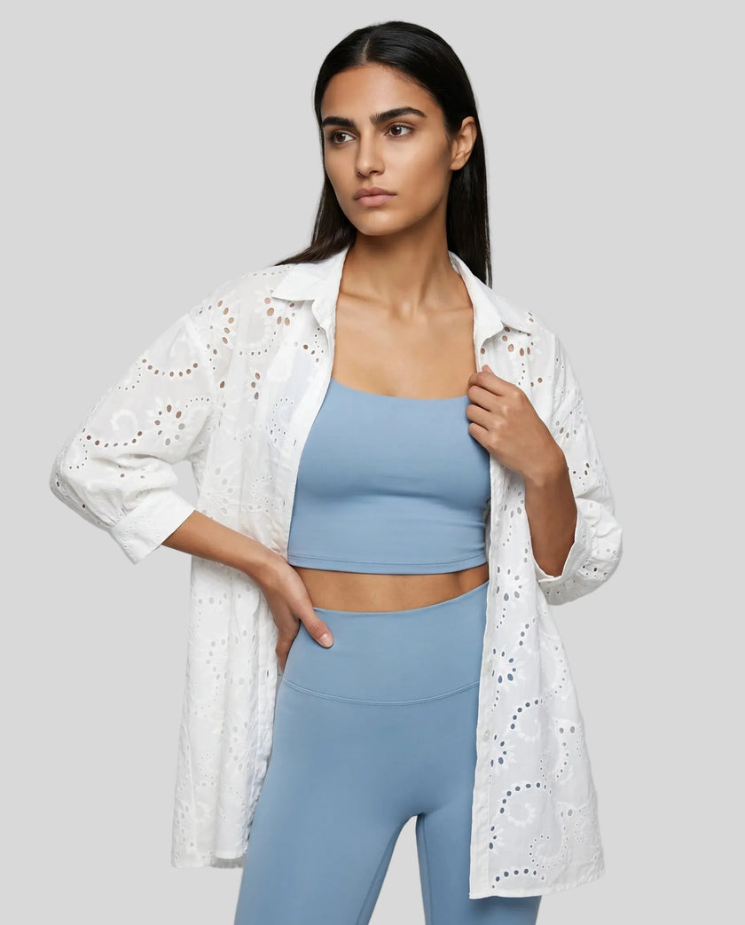 Aira Eyelet Shirt styled as a lightweight layer in white, worn oversized for an effortless elevated look