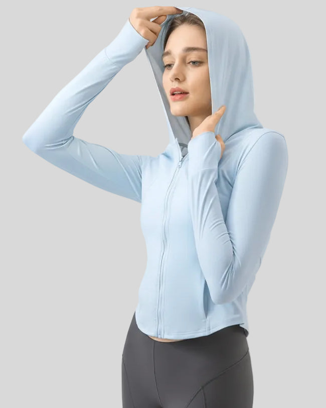Light blue lightweight active hoodie worn with hood up, front view