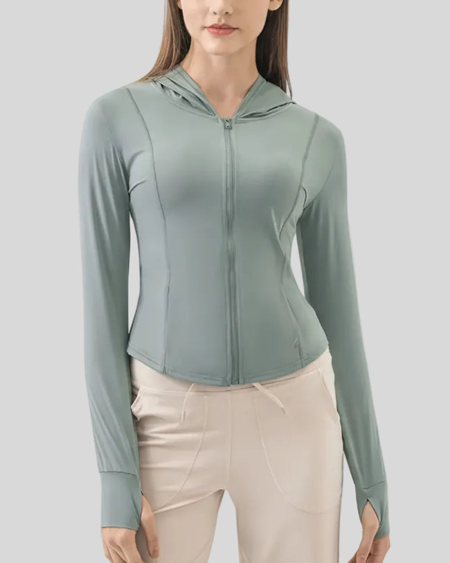 Close-up of teal zip-up active hoodie fabric and front zipper detail