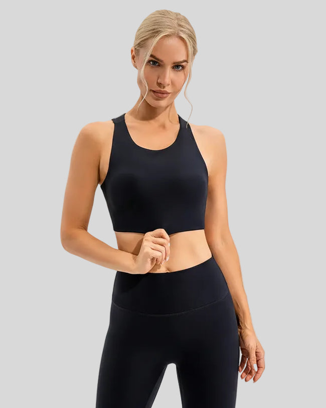 Front view of Athlesi ArcFlow Sports Bra in black highlighting smooth cropped fit