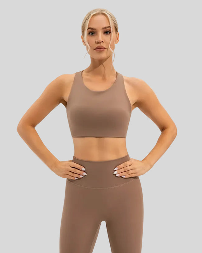 ArcFlow Sports Bra camel front showing minimal front design