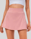 High-rise pleated active skirt in blush pink with smooth waistband and lightweight performance fabric