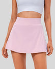 Closeup of high-rise pleated active skirt in pink purple with smooth waistband and lightweight performance fabric