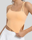 Angled view of AsymFlow Edge Active Cami in sher, showing asymmetrical cut and soft stretch fabricet