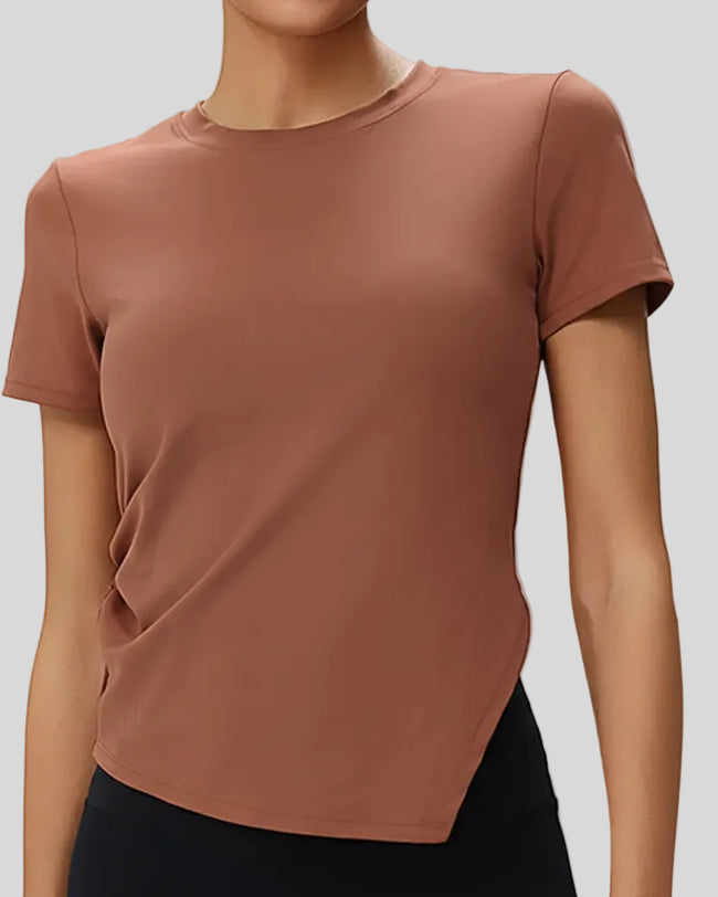 AsymFlow short sleeve active top in bronze with relaxed fit and round neckline