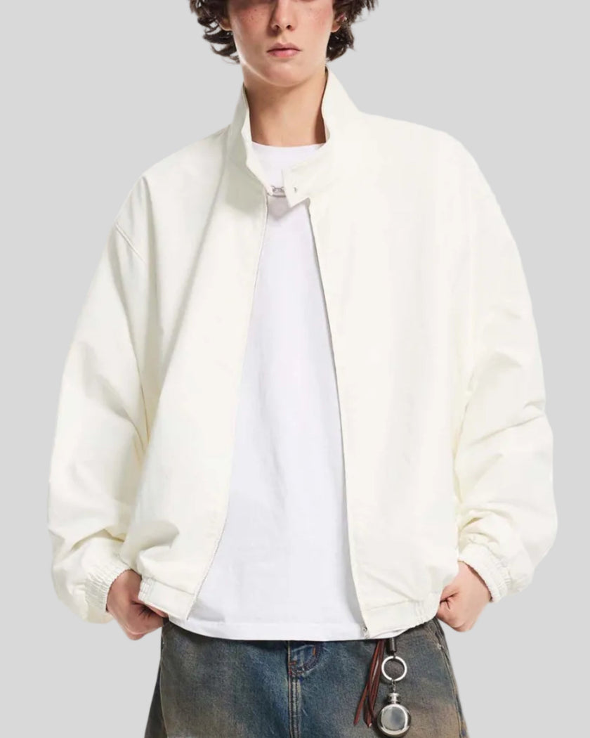 Upper body front view of man wearing Axis Bomber Jacket in Beige
