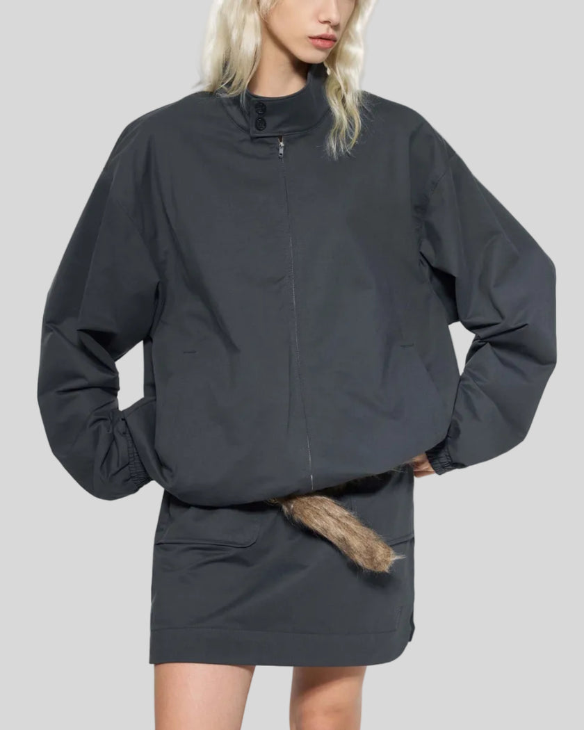Mid body front view of woman wearing Axis Bomber Jacket in Dark Gray