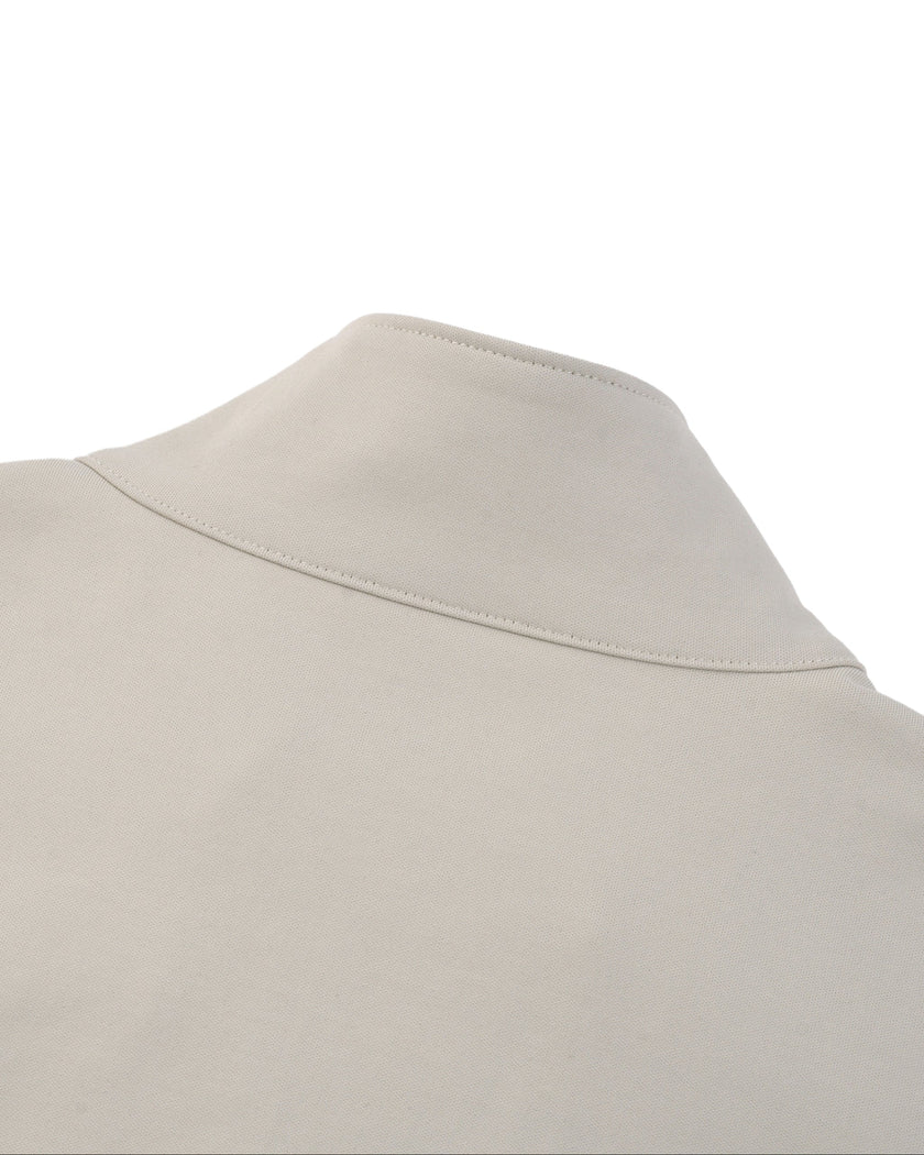 Closeup of back stand collar construction on Axis Bomber Jacket in Gray Camel