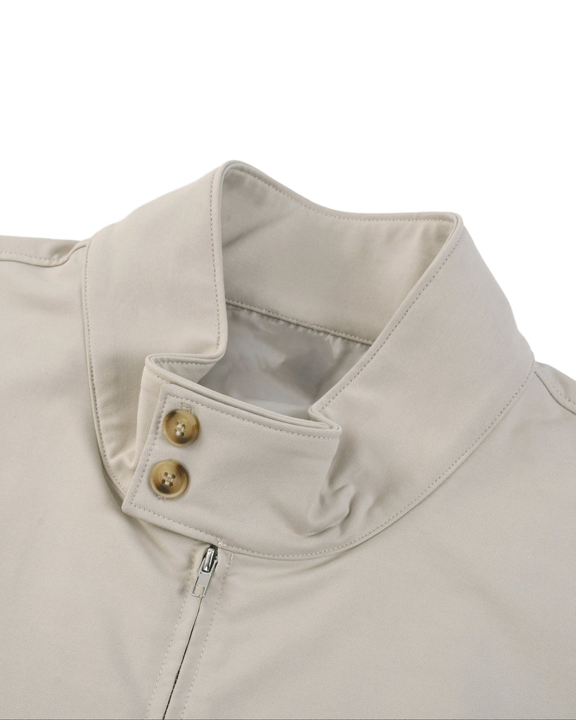 Closeup of stand collar, button detail and front zipper on Axis Bomber Jacket in Gray Camel