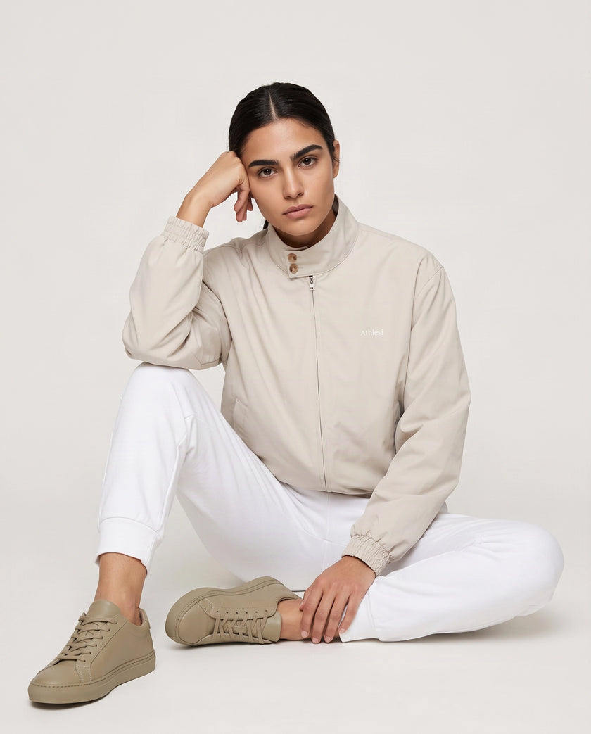 Full body front view of woman wearing Axis Bomber Jacket in Gray Camel
