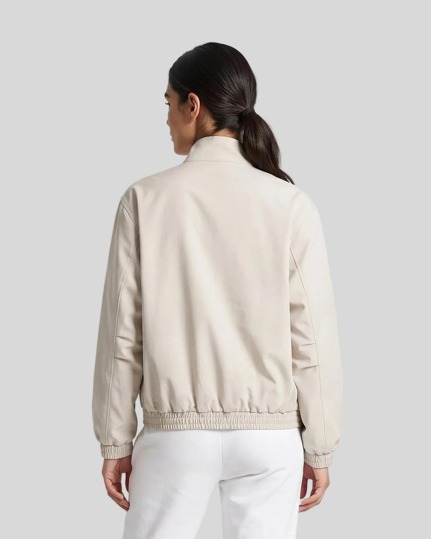 Upper body back view of woman wearing Axis Bomber Jacket in Gray Camel