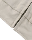 Closeup of waist hem on Axis Bomber Jacket in Gray Camel