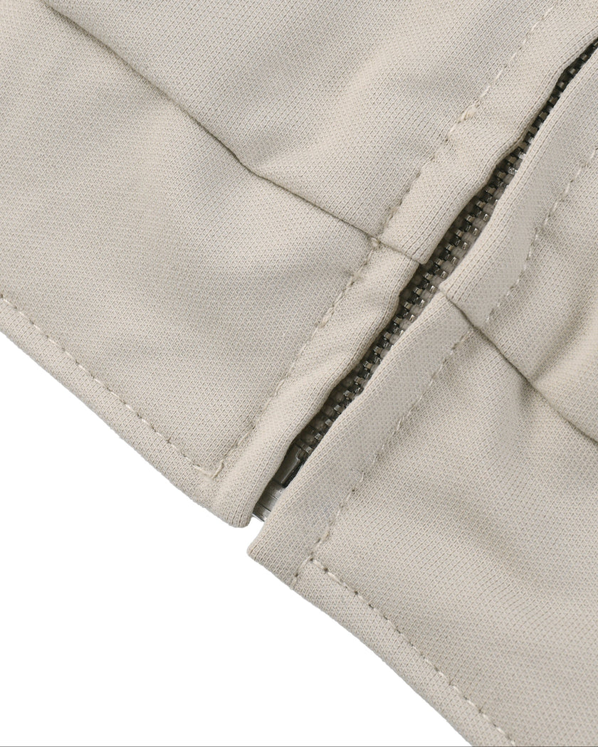 Closeup of waist hem on Axis Bomber Jacket in Gray Camel