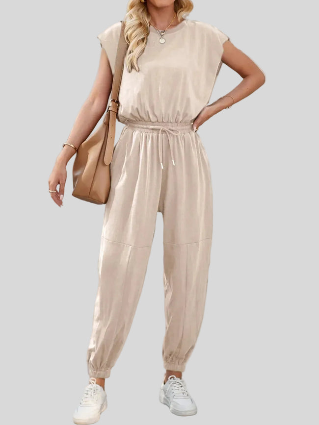 Open-back drawstring waist jumpsuit in Dust Storm shown from the front