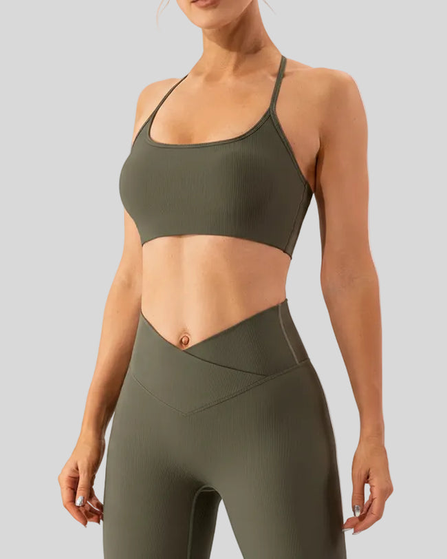 Lightweight sports bra with thin straps in matcha green shown from a front angle