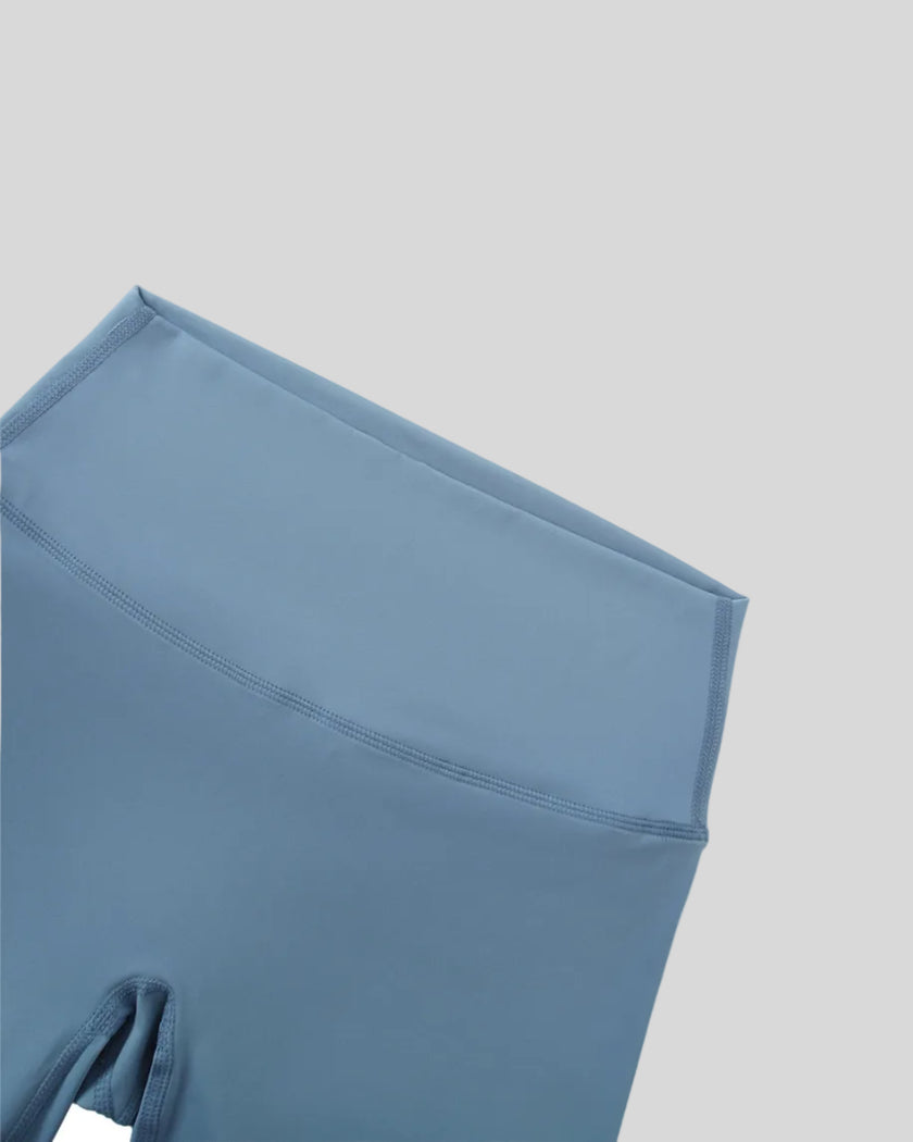 BaseLine Biker Shorts in gray blue, front waistband detail close-up