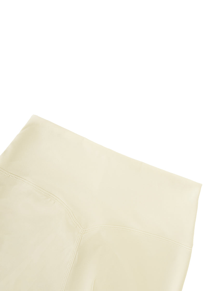 BaseLine High-Waisted Leggings in apricot, back waistband detail close-up