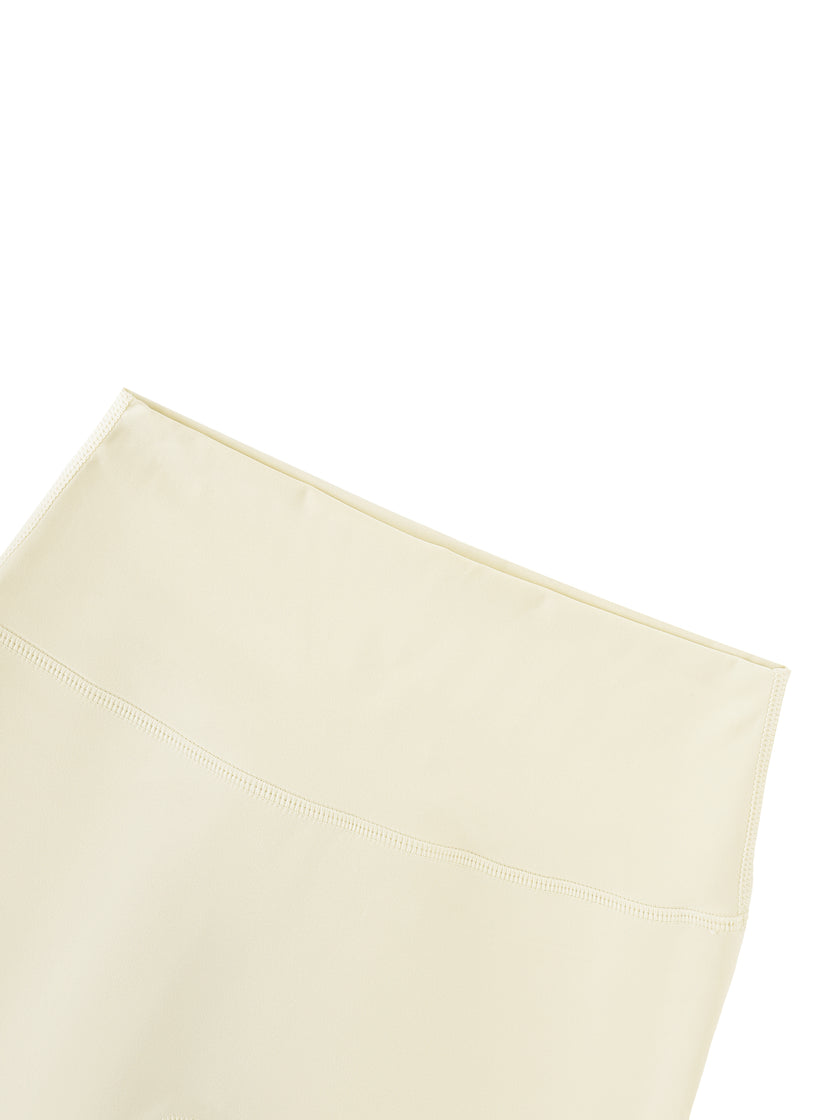 BaseLine High-Waisted Leggings in apricot, front waistband detail close-up