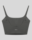 BaseLine Sports Bra in dark gray, flatlay back view with clean minimal design