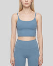 BaseLine Sports Bra in gray blue, mid body front view