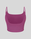 BaseLine Sports Bra in purple, 3D back view with clean minimal design