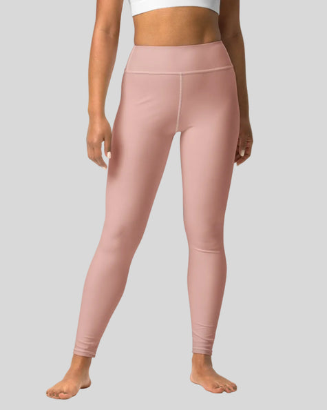 Front view mid shot of woman wearing Blush Form legging in soft blush
