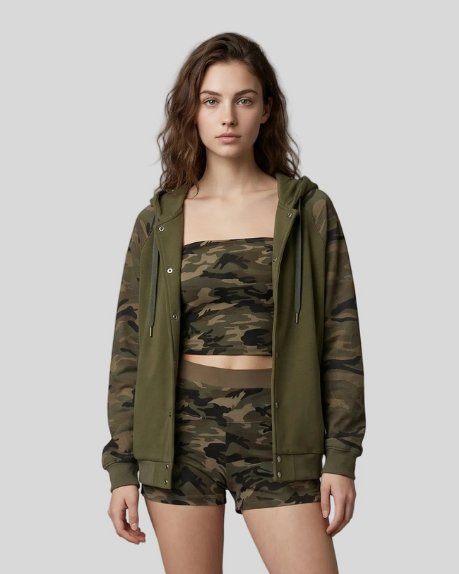 Mid body front view of woman wearing Camo Accent Hoodie in army green with green camo sleeves