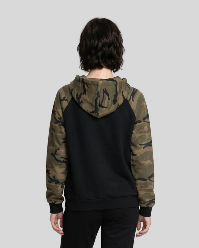 Mid body back view of woman wearing black Camo Accent Hoodie with green camo hood and sleeves