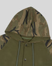 Closeup of drawstring hood, green camo raglan panels and button-front detail on Camo Accent Hoodie