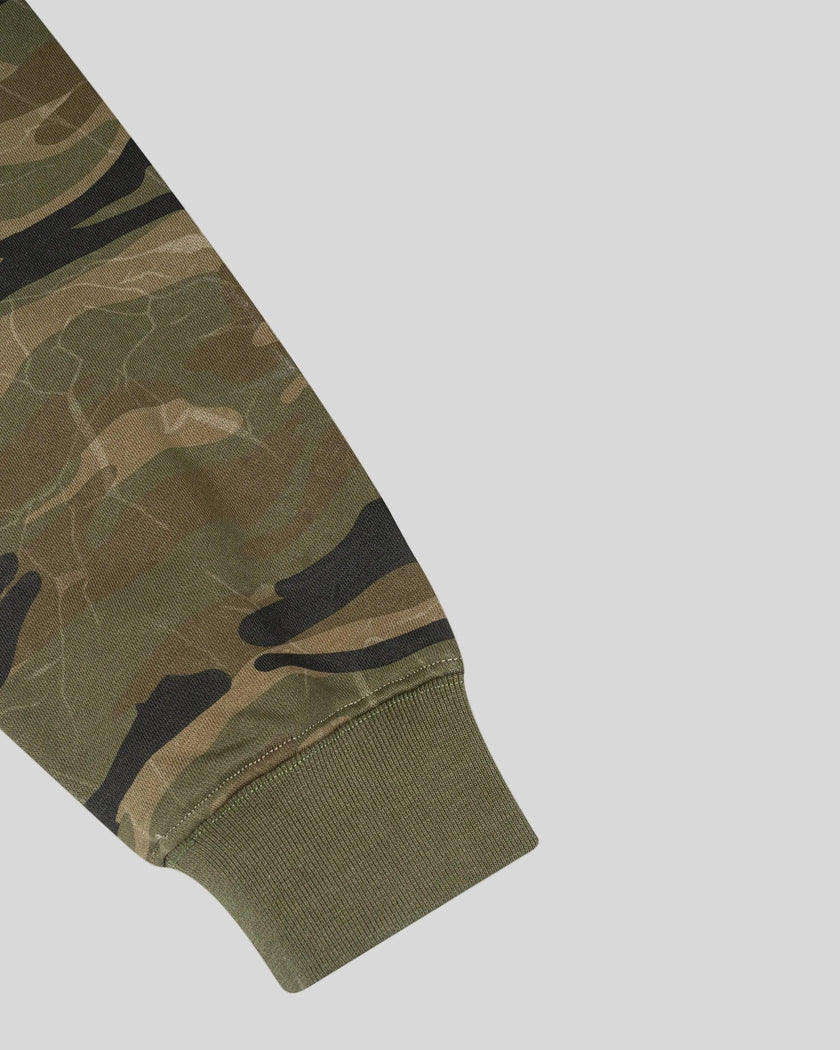 Closeup of green camo sleeve and ribbed cuff on Camo Accent Hoodie